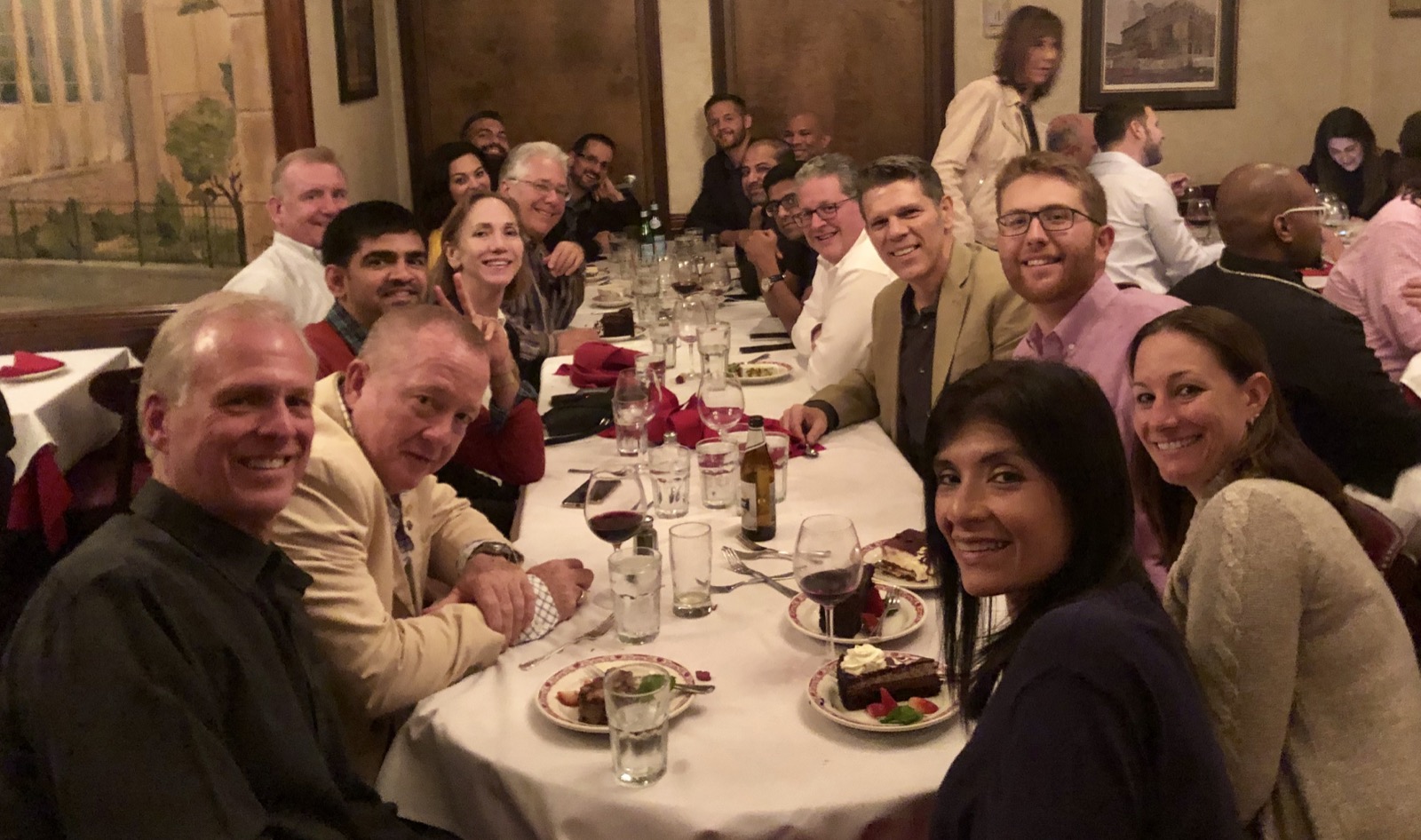 Full dinner table with executives